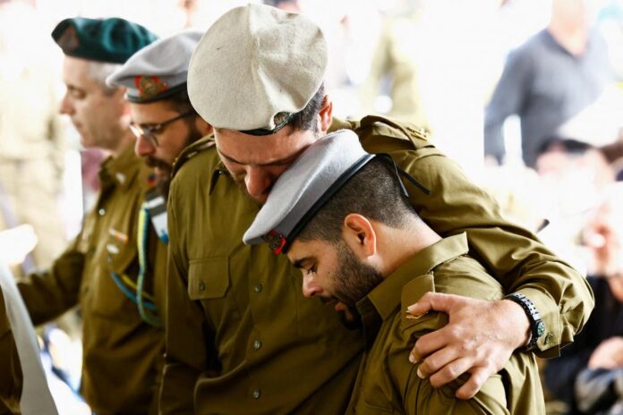 2024-01-01T122717Z_3050311_RC2Z85AETH54_RTRMADP_3_ISRAEL-PALESTINIANS-SOLDIER-FUNERAL