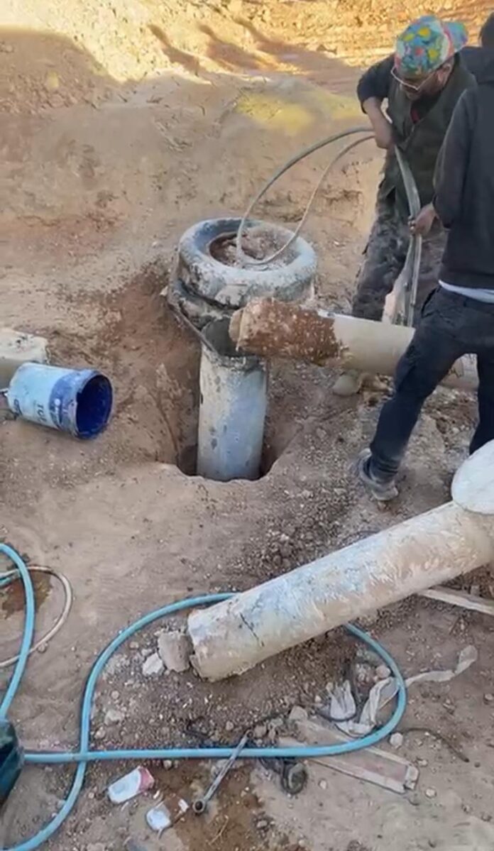 ردم بئر وضبط حفارة مخالفة وحجزها بالجفر - صور