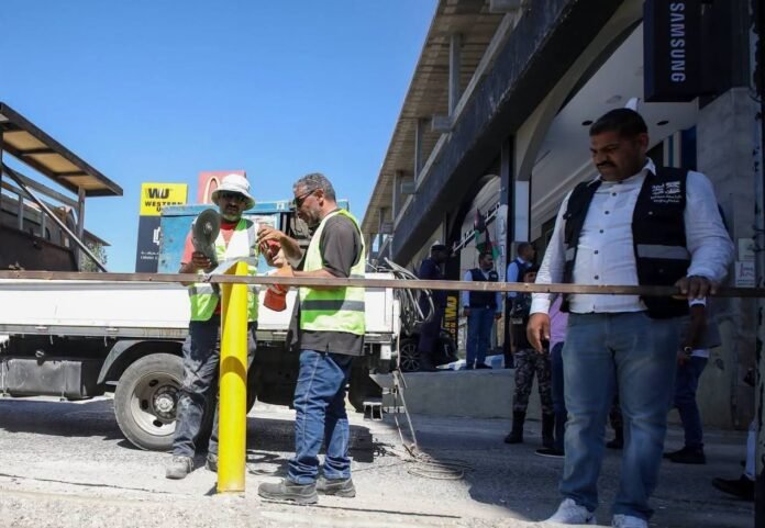 الأمانة تبدأ أعمال تعبيد ليلية في شارع الملكة علياء